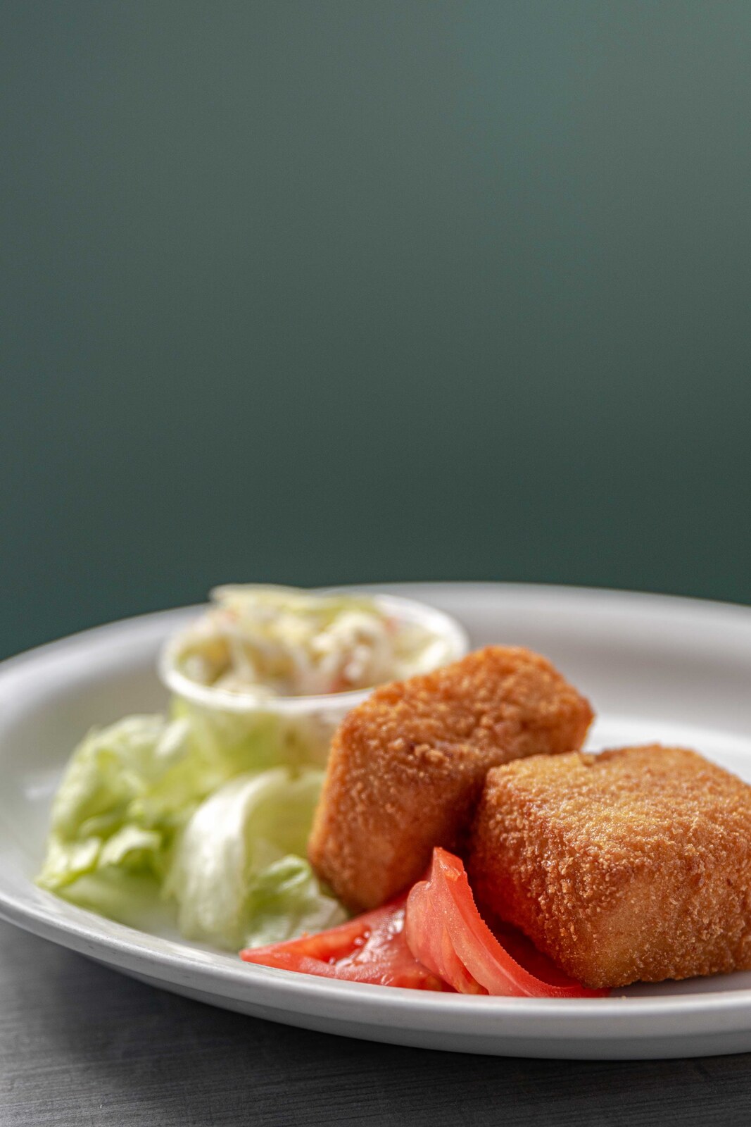 Bâtonnets de fondue parmesan croustillants servis en entrée chez Casse-Croûte Pierrot à Limoilou